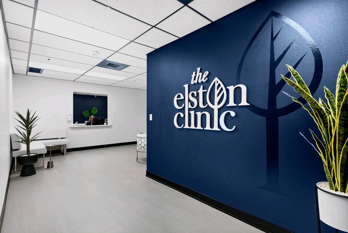Image of the entry way wall, with hanging Elston Clinic sign
